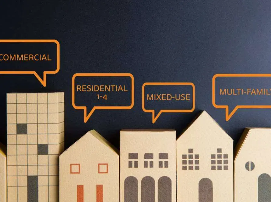 Miniature commercial and residential property models representing real estate investors