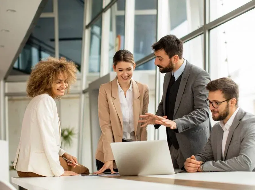 Startup team collaborating on an early business plan and launch strategy