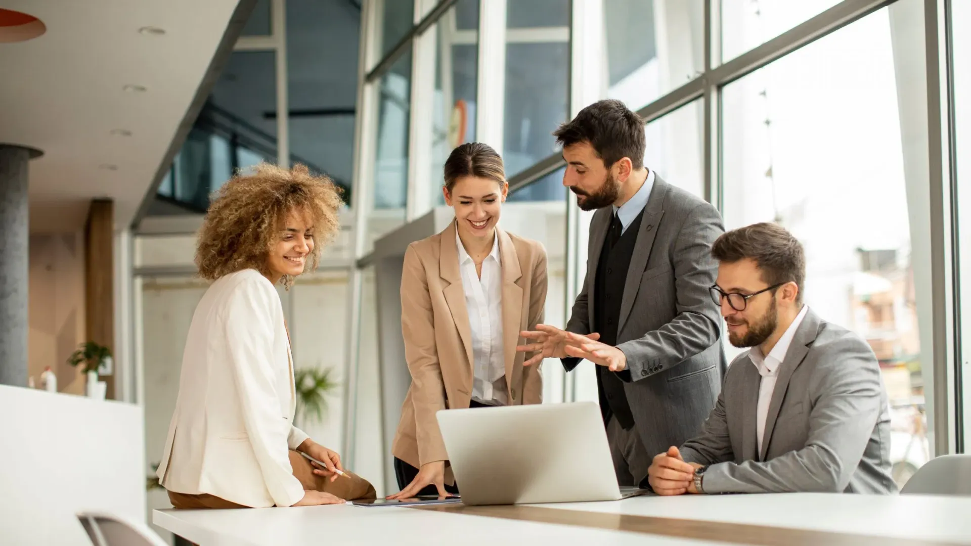 Startup founders reviewing a business plan together at a strategy table